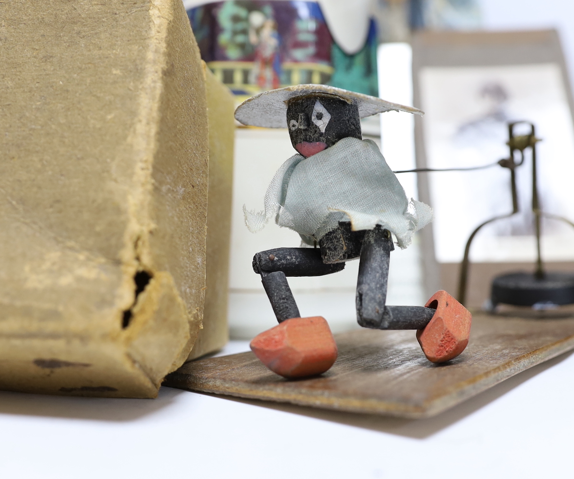 Gilbert & Sullivan and D’Oyly interest; a collection of ceramics, puppets, photographs, etc. including a Nanki Poo Toby jug, a D’Oyly Carte engraved pewter mug, a ‘Ninky Poo’ gramophone operated Clog Dancer, etc.